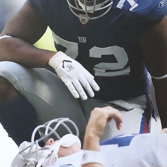 New York football giants Osi sacks Romo. One of the best pics in giants history - Picture 3 of 7